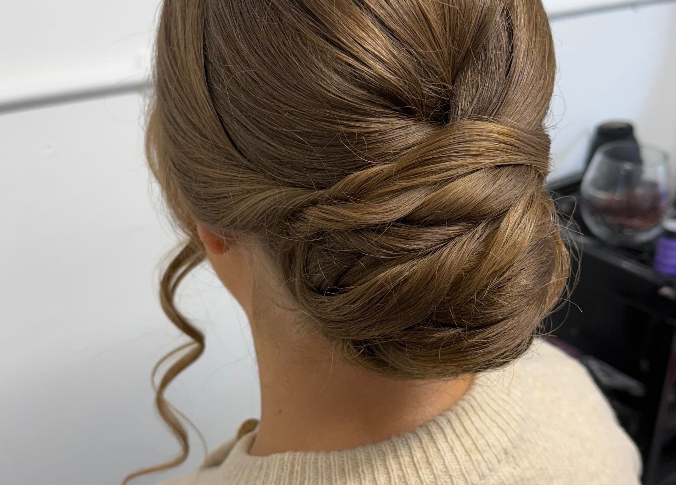 Elegant updo hairstyle at ShaunaCanning hair&beauty, Limavady, Northern Ireland, GB. Perfect for special occasions.