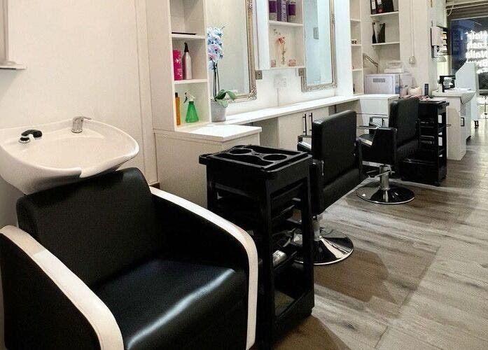 Stylish salon chairs and mirrors at HASO LONDON nail and beauty, London, England, GB.