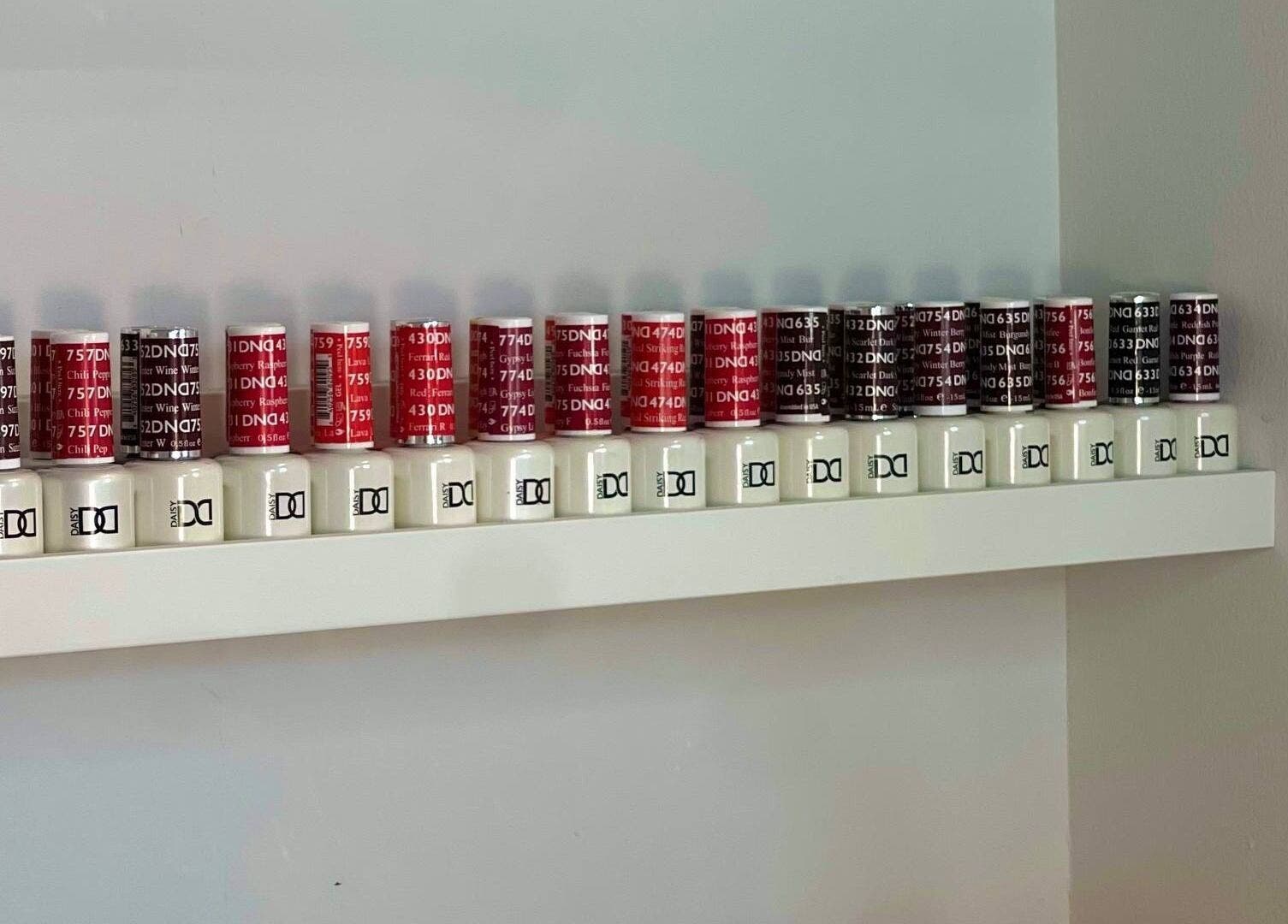 Nail polish bottles at HASO LONDON nail and beauty, London, England, GB, showcasing vibrant colors.