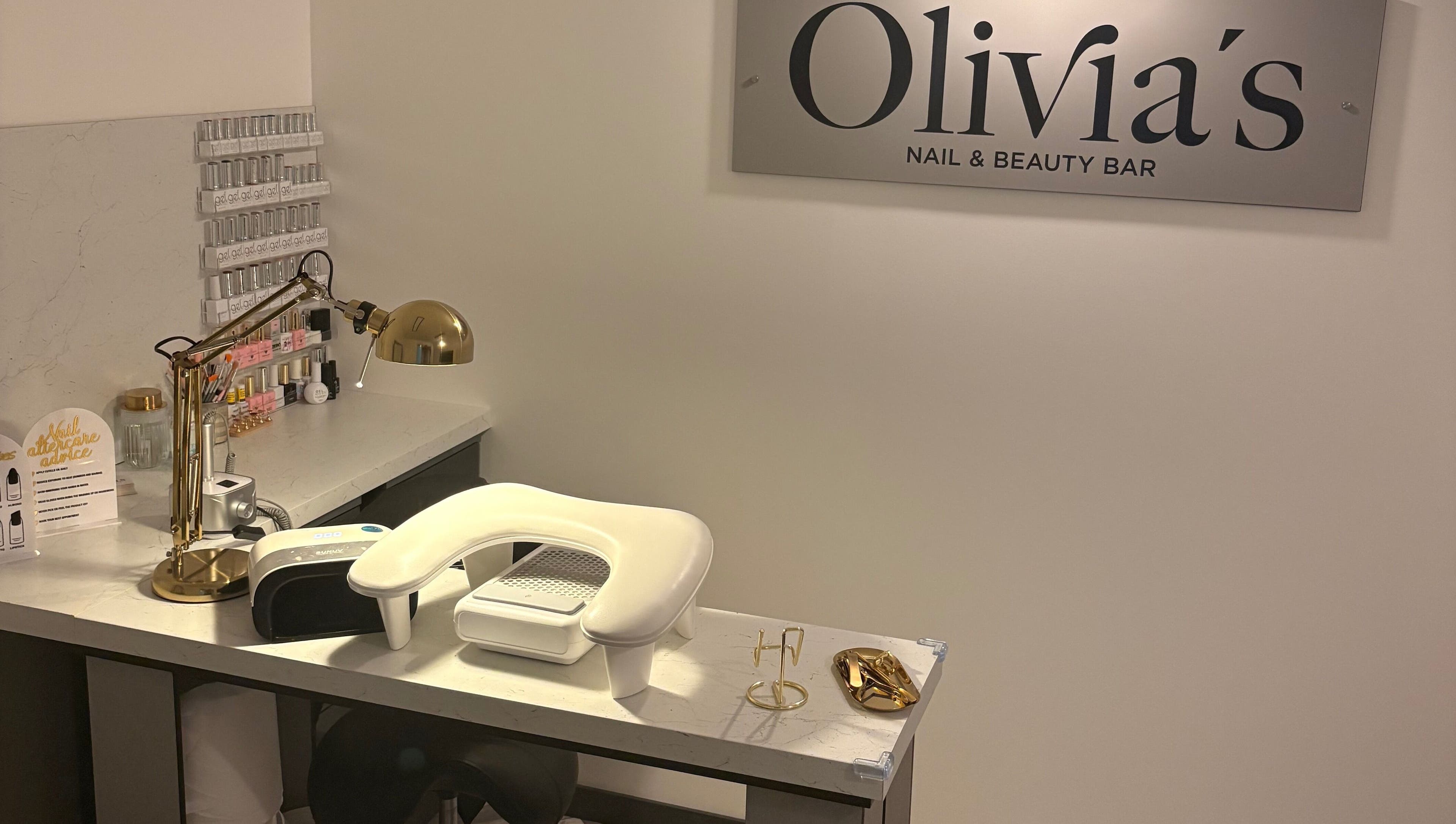 Stylish nail station at Olivia’s Nail and Beauty Bar, Motherwell, Scotland, GB with chic decor and tools.