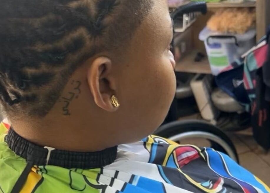 Close-up of dreadlock hairstyle at ExpensiveCuts, Willemstad, Curaçao, CW.