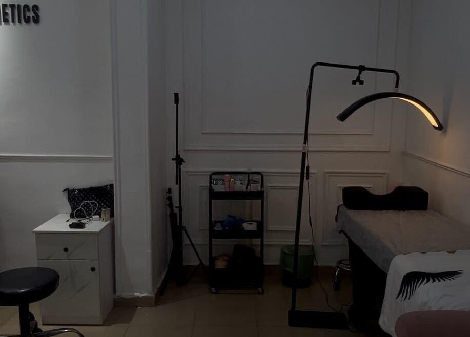 Cozy treatment room at Kitanaesthetics, Lagos, Lagos, NG with soft lighting and comfortable seating.