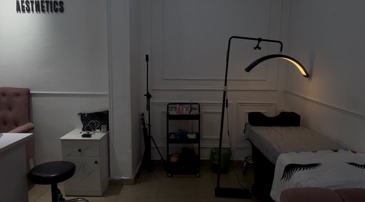 Cozy treatment room at Kitanaesthetics, Lagos, Lagos, NG with soft lighting and comfortable seating.