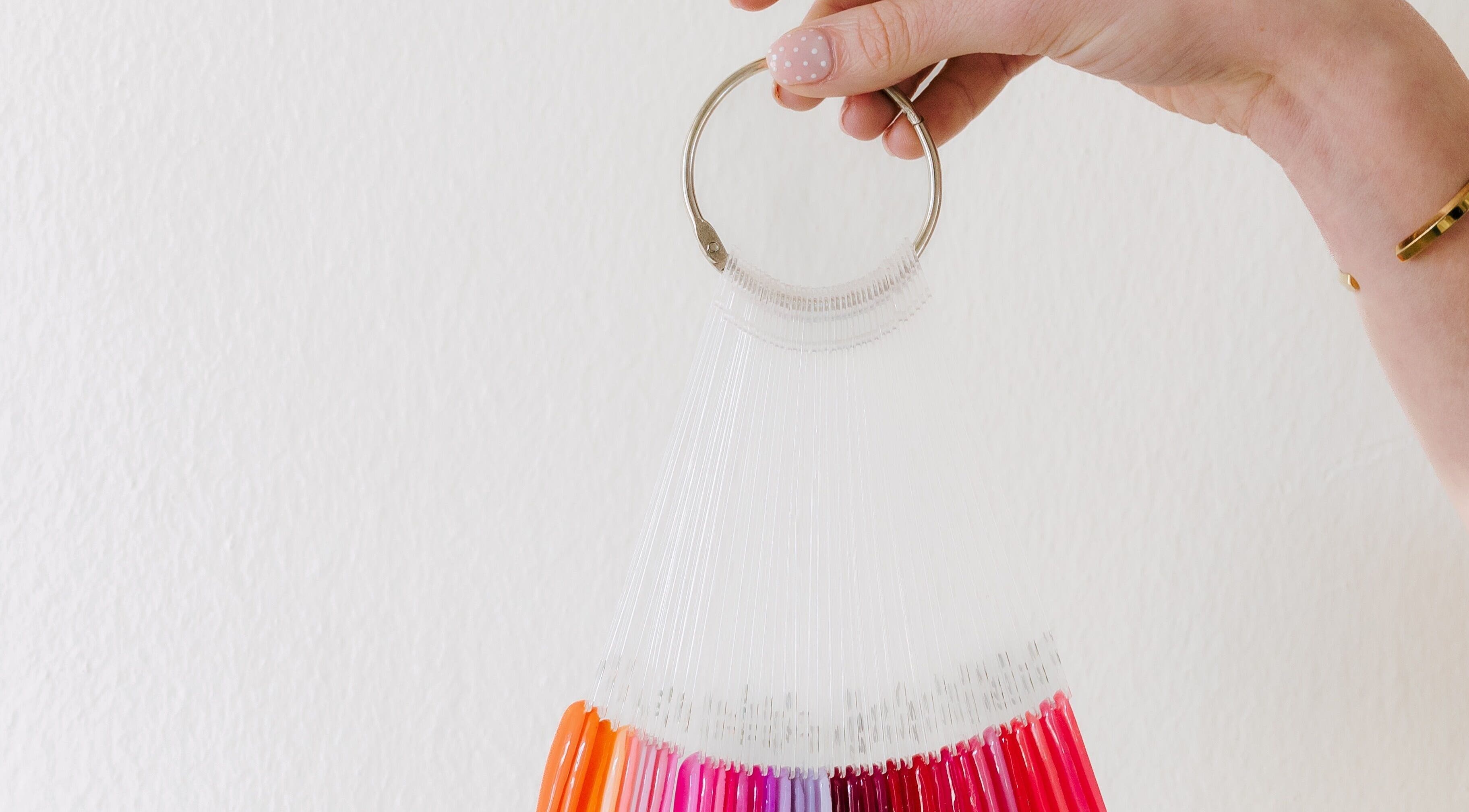 Colorful nail polish swatch ring at Heath Chromatic, Pretoria, Gauteng, ZA. Explore vibrant shades and designs.