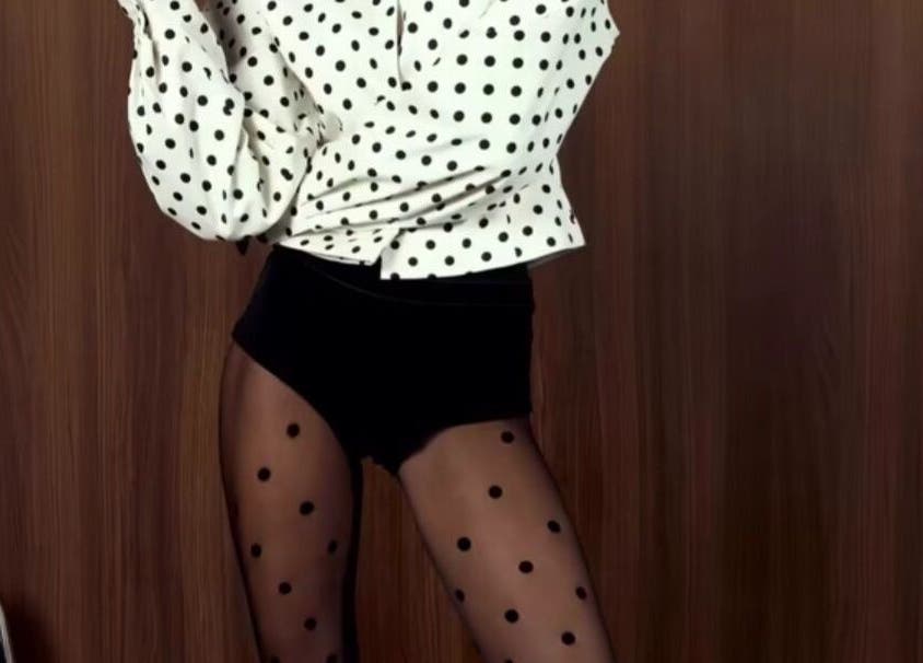 Fashionable polka dot outfit at B’yadecha, Québec, Québec, CA, showcasing modern style.