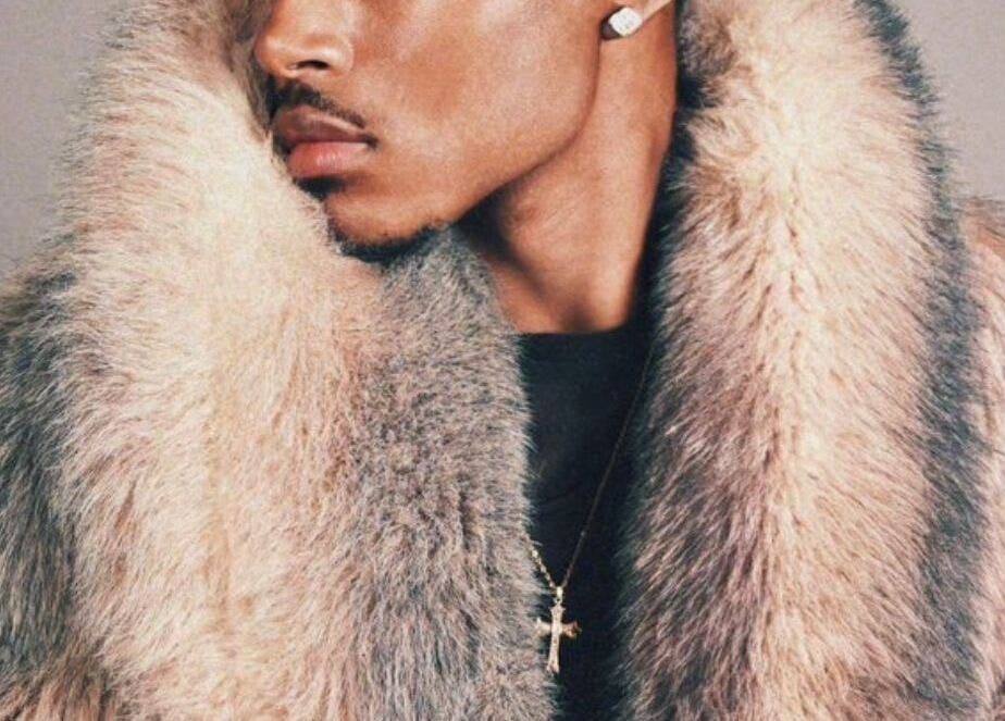 Elegant fur coat on display at B’yadecha, Québec, Québec, CA showcasing luxury and style.