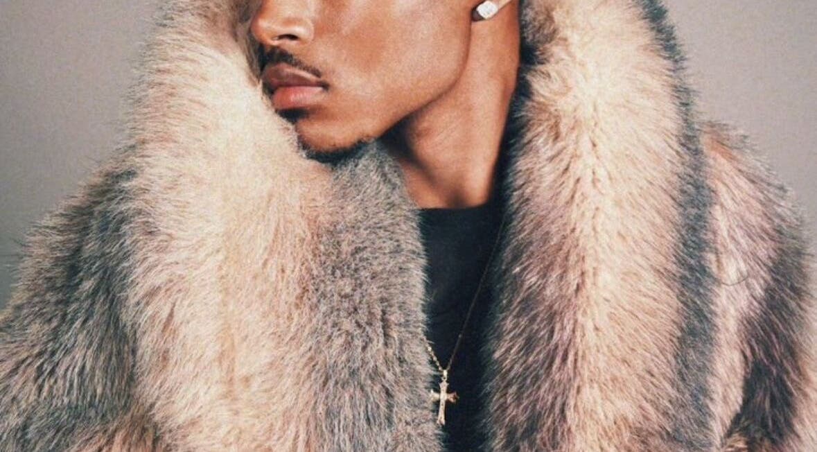 Elegant fur coat on display at B’yadecha, Québec, Québec, CA showcasing luxury and style.