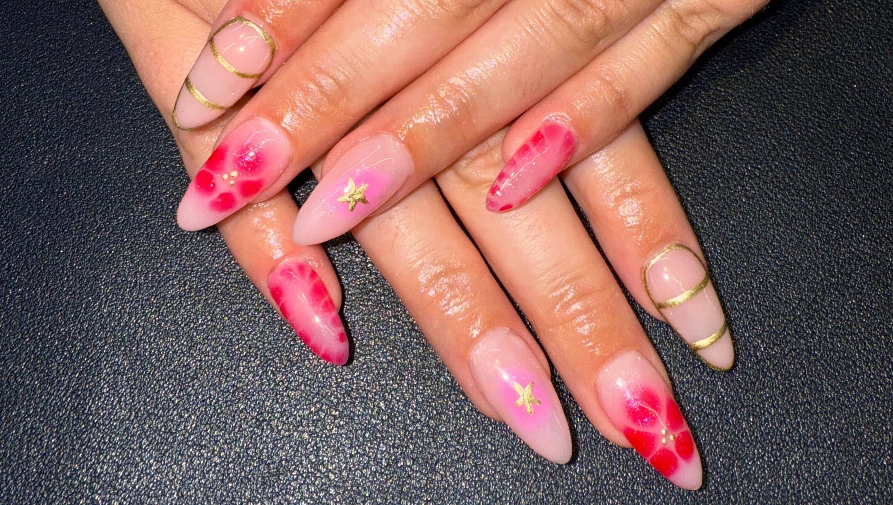 Elegant floral and gold nail art from Nails By SHTB in Wick, Scotland, GB, showcasing detailed hand designs.