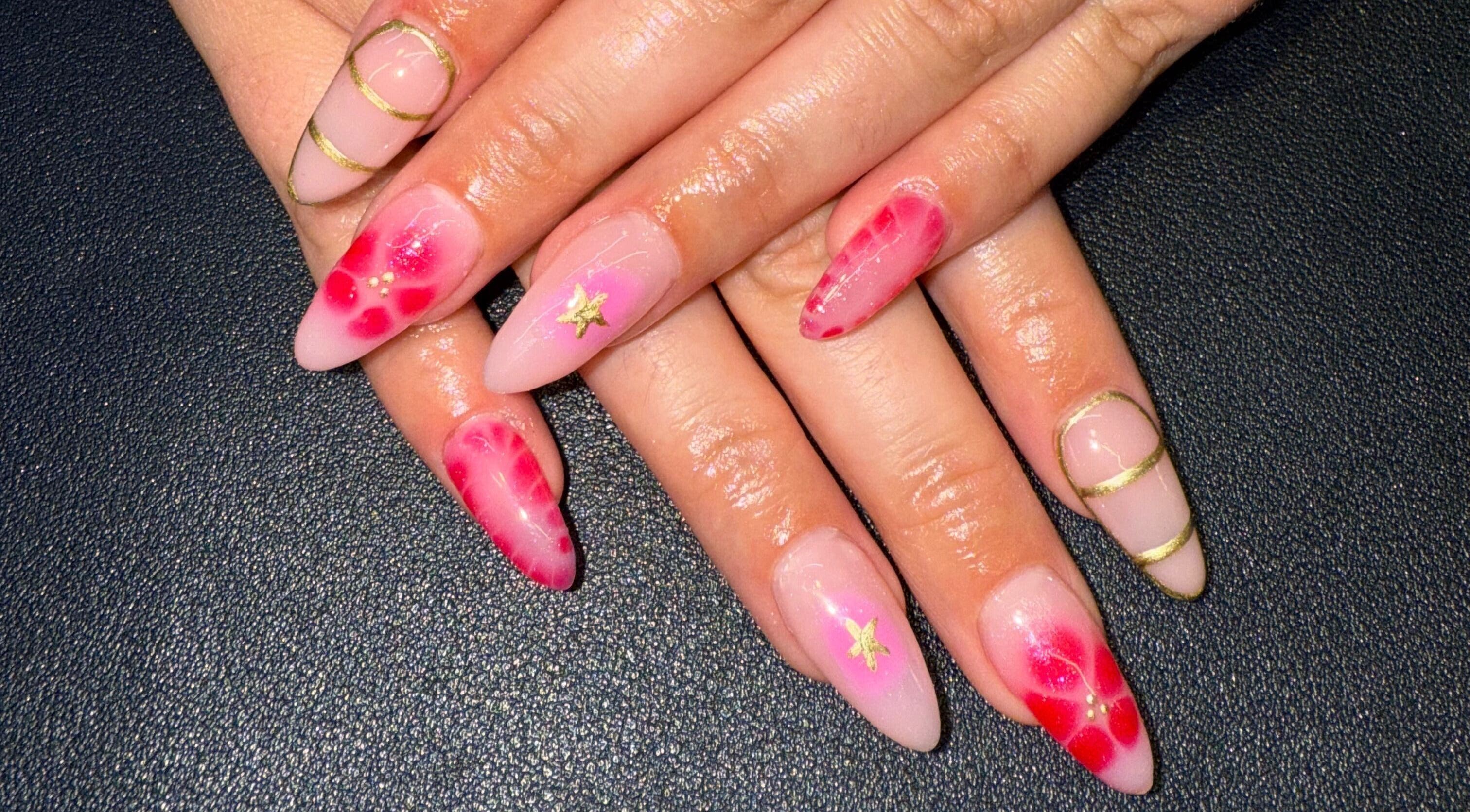 Elegant floral and gold nail art from Nails By SHTB in Wick, Scotland, GB, showcasing detailed hand designs.