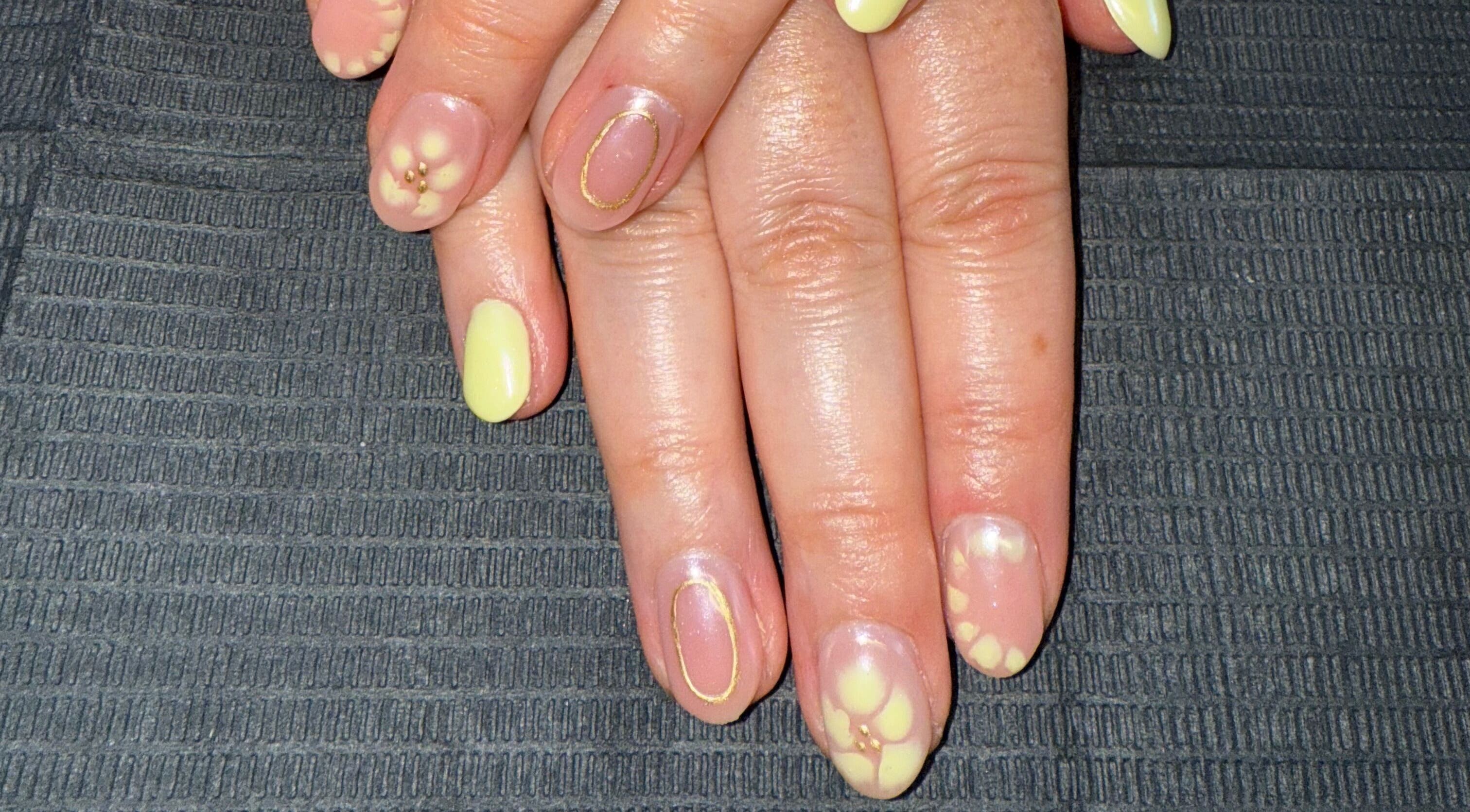 Elegant yellow floral nail art by Nails By SHTB in Wick, Scotland, GB. Perfect for summer vibes.