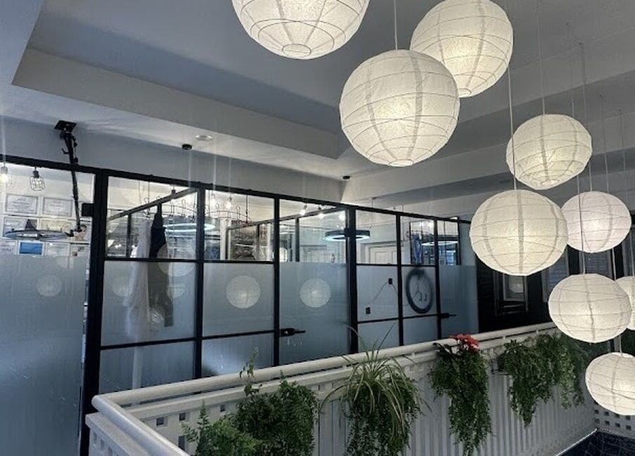 Elegant hanging lamps at Iryna Bliss, Killarney, County Kerry, IE, enhancing serene ambiance.