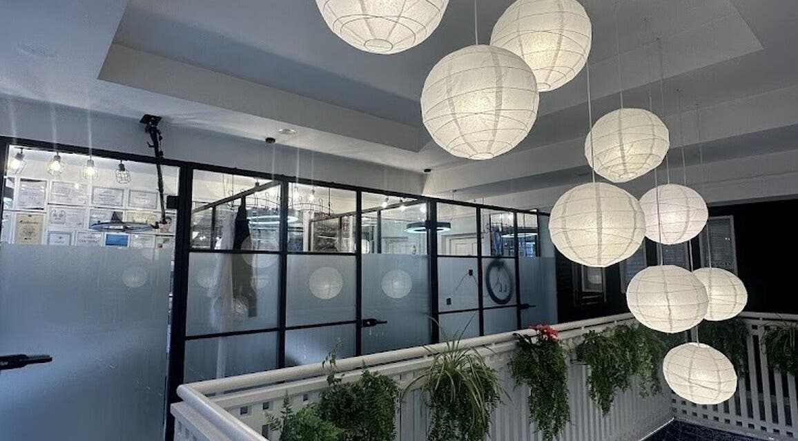 Elegant hanging lamps at Iryna Bliss, Killarney, County Kerry, IE, enhancing serene ambiance.