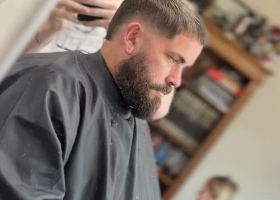 Customer receiving a haircut at Red Rabbit Barber in Langley Moor, England, GB. A beard trim in progress.
