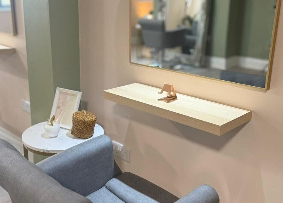 Chic styling area at Red Rabbit Barber, Langley Moor, England, GB, featuring a modern chair and mirror.