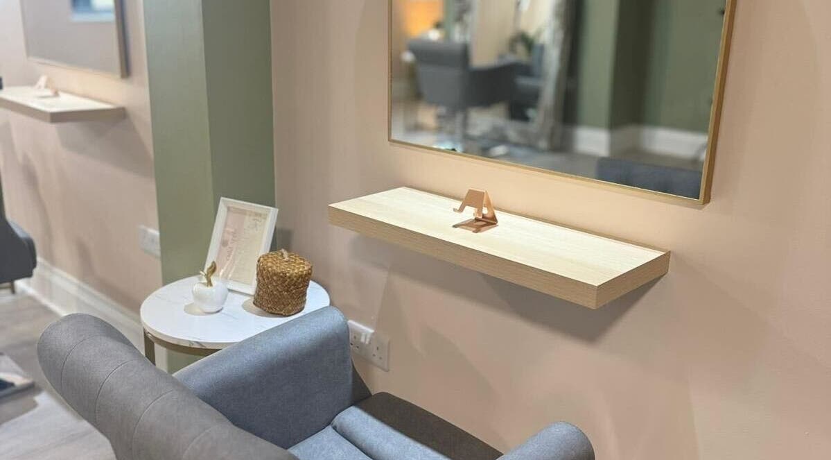 Chic styling area at Red Rabbit Barber, Langley Moor, England, GB, featuring a modern chair and mirror.