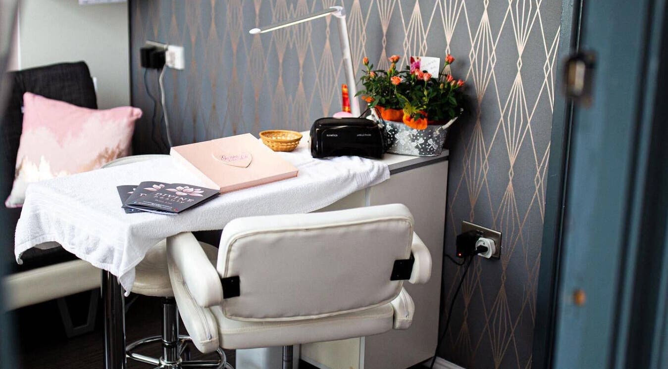 Stylish nail station at Divine Beauty Salon, Guernsey, Saint Peter Port, GG, featuring a comfortable chair and floral decor.