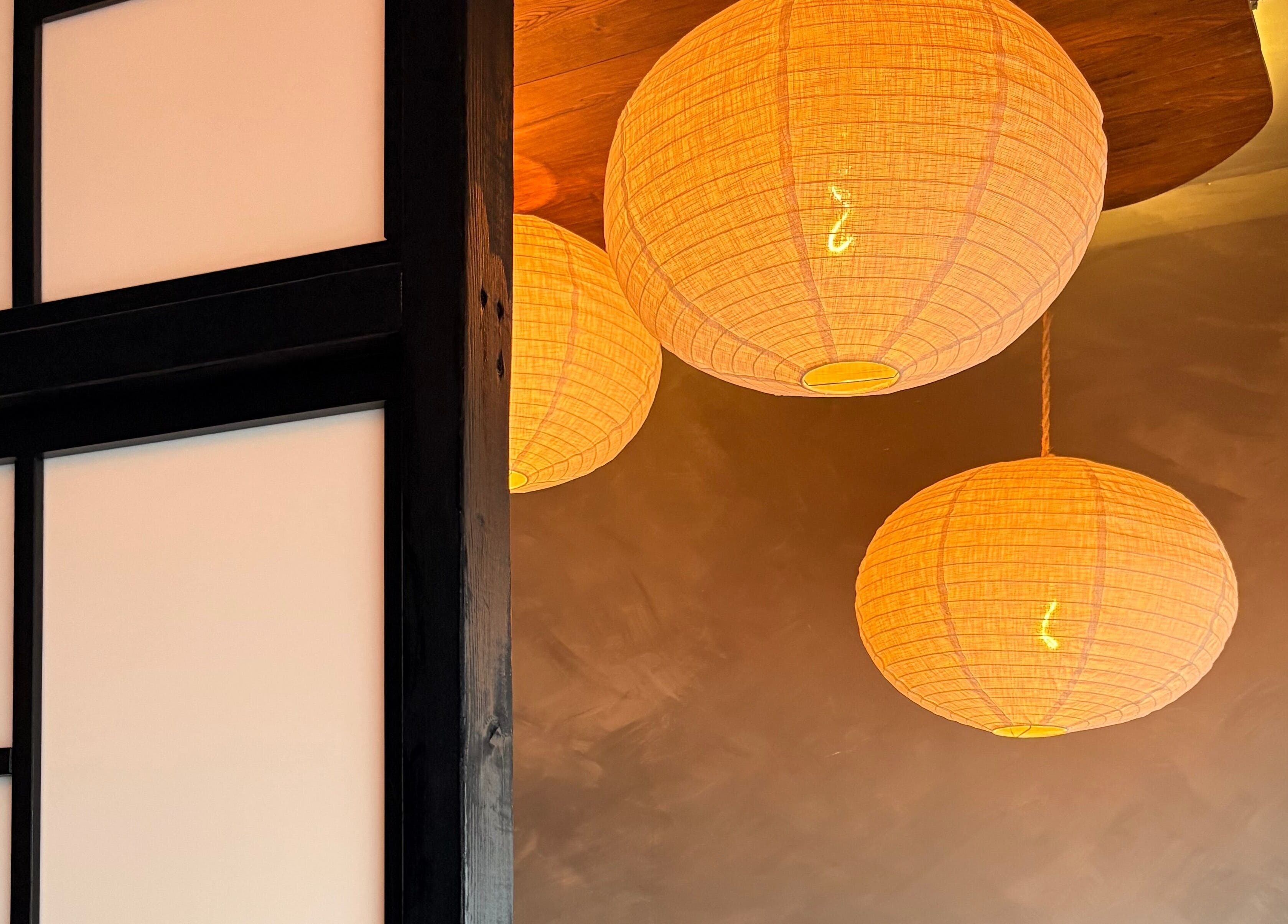 Elegant paper lanterns hanging at N a n d o | Massage Therapy, Dalkey, County Dublin, IE.