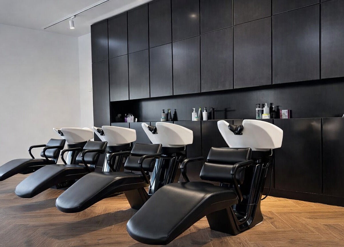 Elegant wash stations at Mariage Beauty Center, Abu Dhabi, AE, showcasing modern salon design.