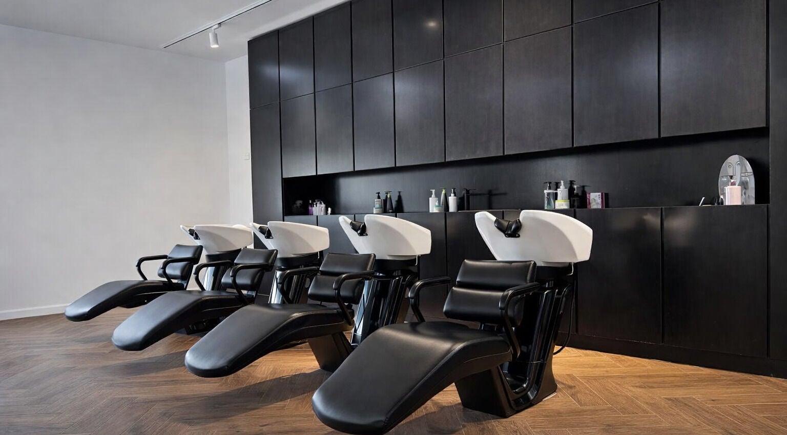 Elegant wash stations at Mariage Beauty Center, Abu Dhabi, AE, showcasing modern salon design.