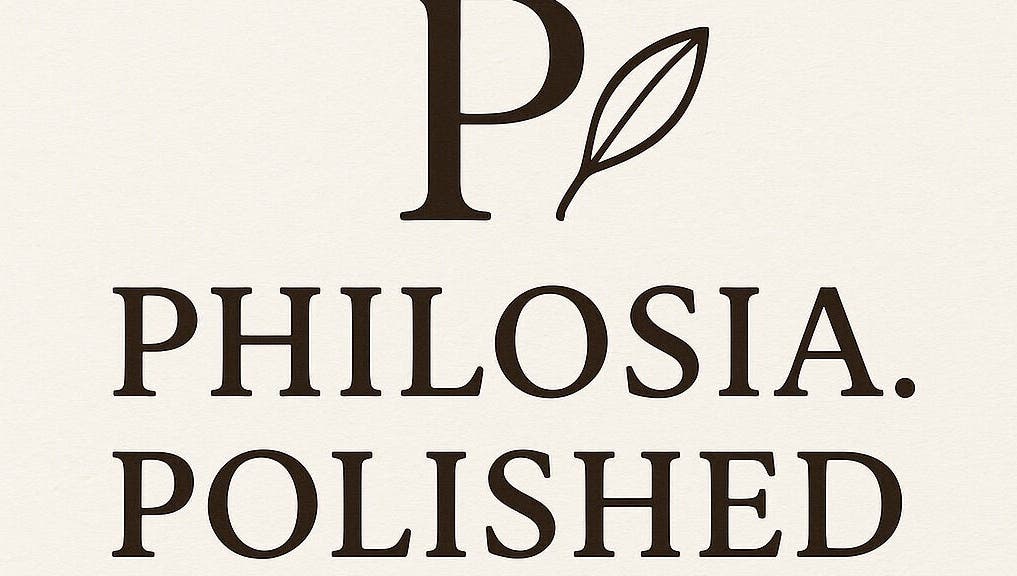 Elegant logo of _philosia.polished in Castries, Castries, LC with a leaf motif.