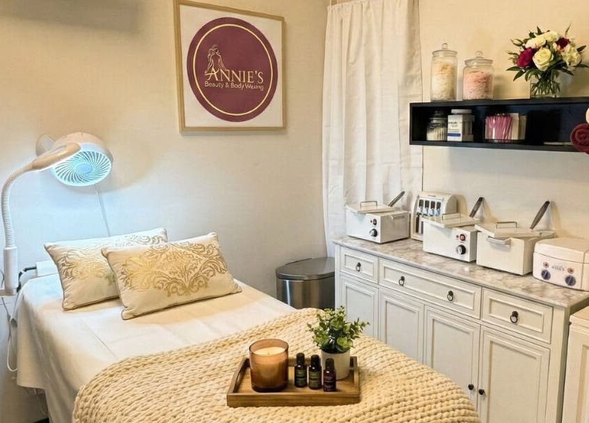 Relaxing treatment room at Annie's Beauty & Body Waxing, Orlando, Florida, US, featuring elegant decor.