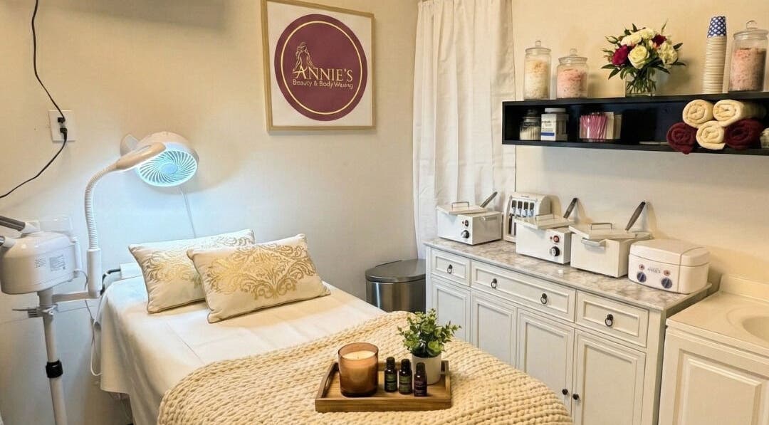 Relaxing treatment room at Annie's Beauty & Body Waxing, Orlando, Florida, US, featuring elegant decor.