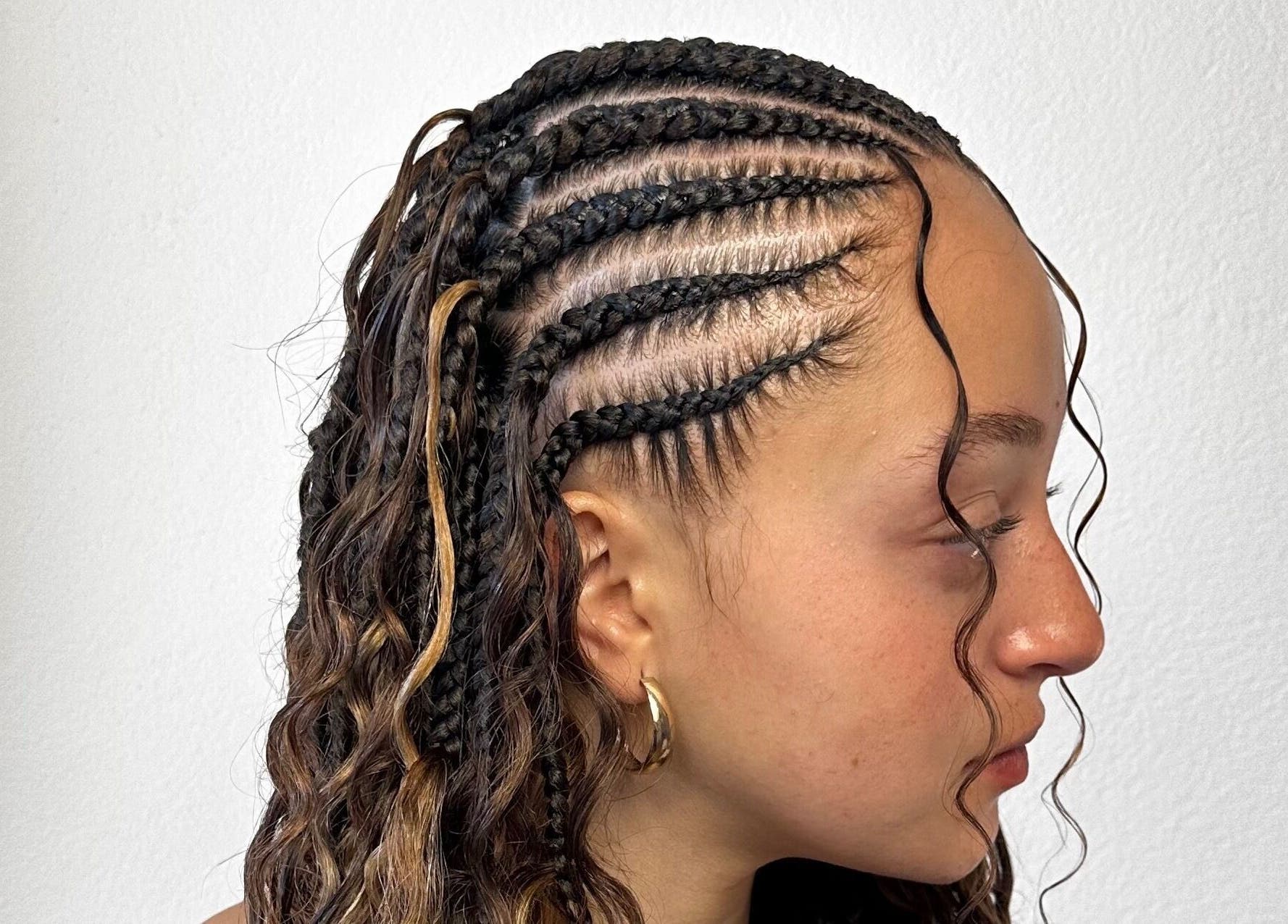 Beautiful braided hairstyle by BRAIDS BY OLMA, showcasing intricate design in Münsingen, Bern, CH.