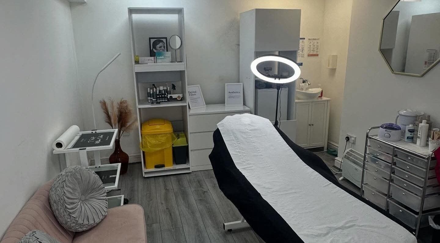 Cozy treatment room at FlawlessFeaturesbyJade in Plymouth, England, GB, featuring modern aesthetic equipment.