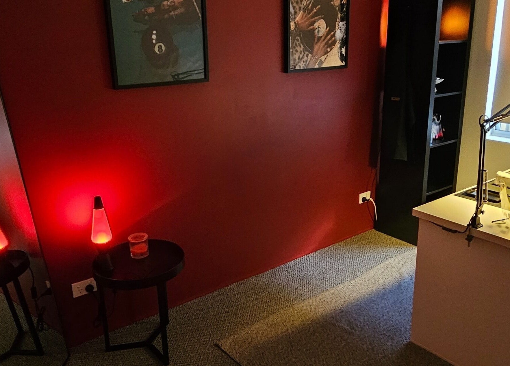 Warm, inviting interior of Polished By V in Yanchep, Western Australia, with unique lava lamp ambiance.