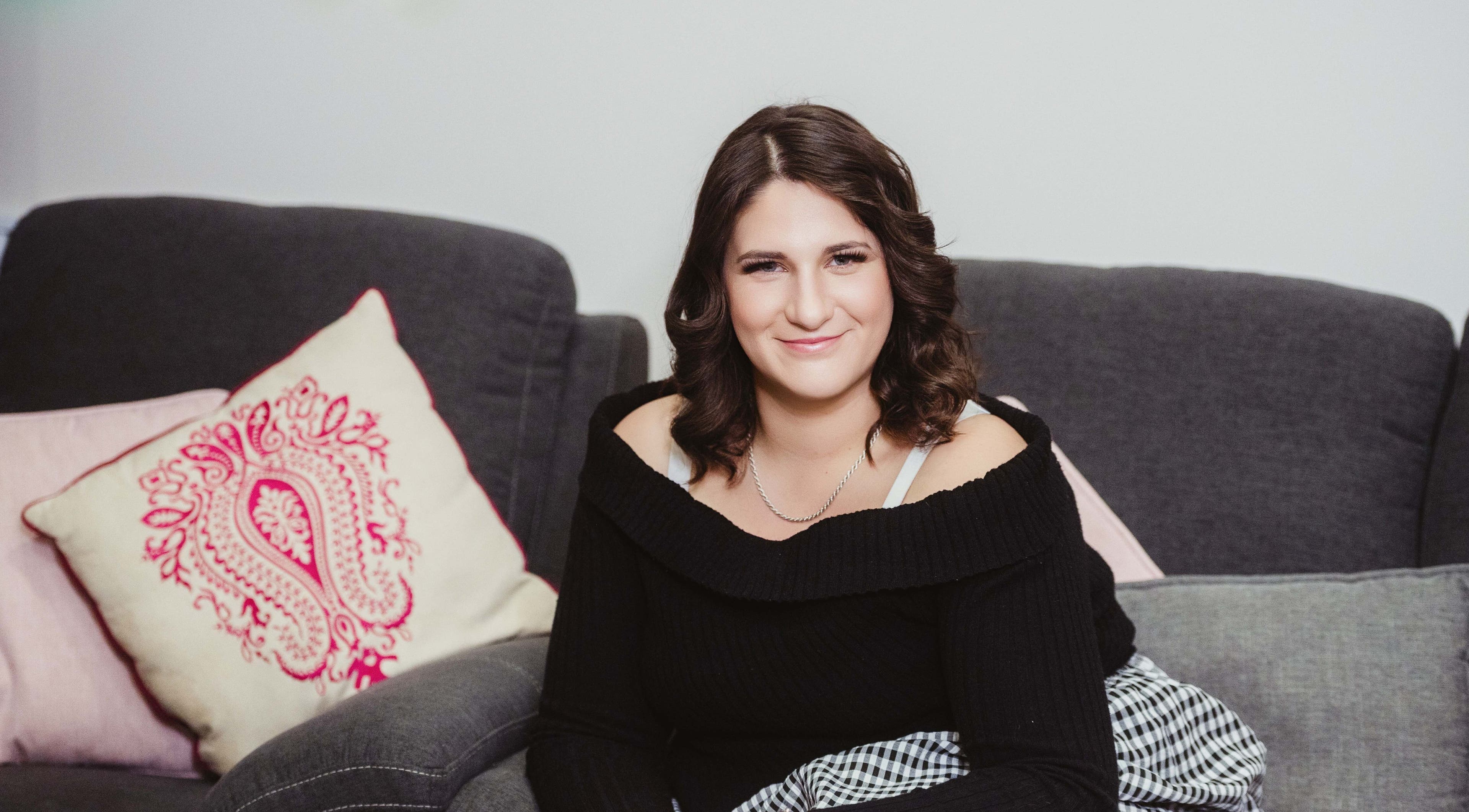 Comfortable seating area at Harmonics Hairdressing, Merbein, Victoria, AU, featuring stylish cushions.