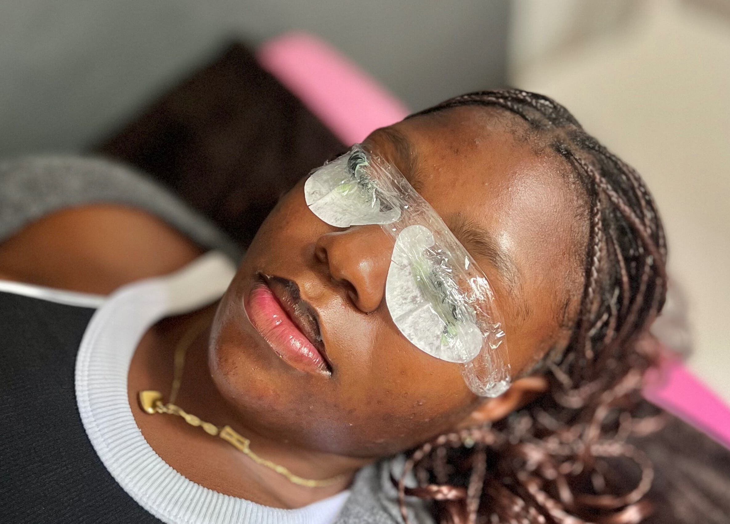 Client relaxing during treatment at Azure beauty parlour eyelashes and makeup, Kitwe, Copperbelt Province, ZM.