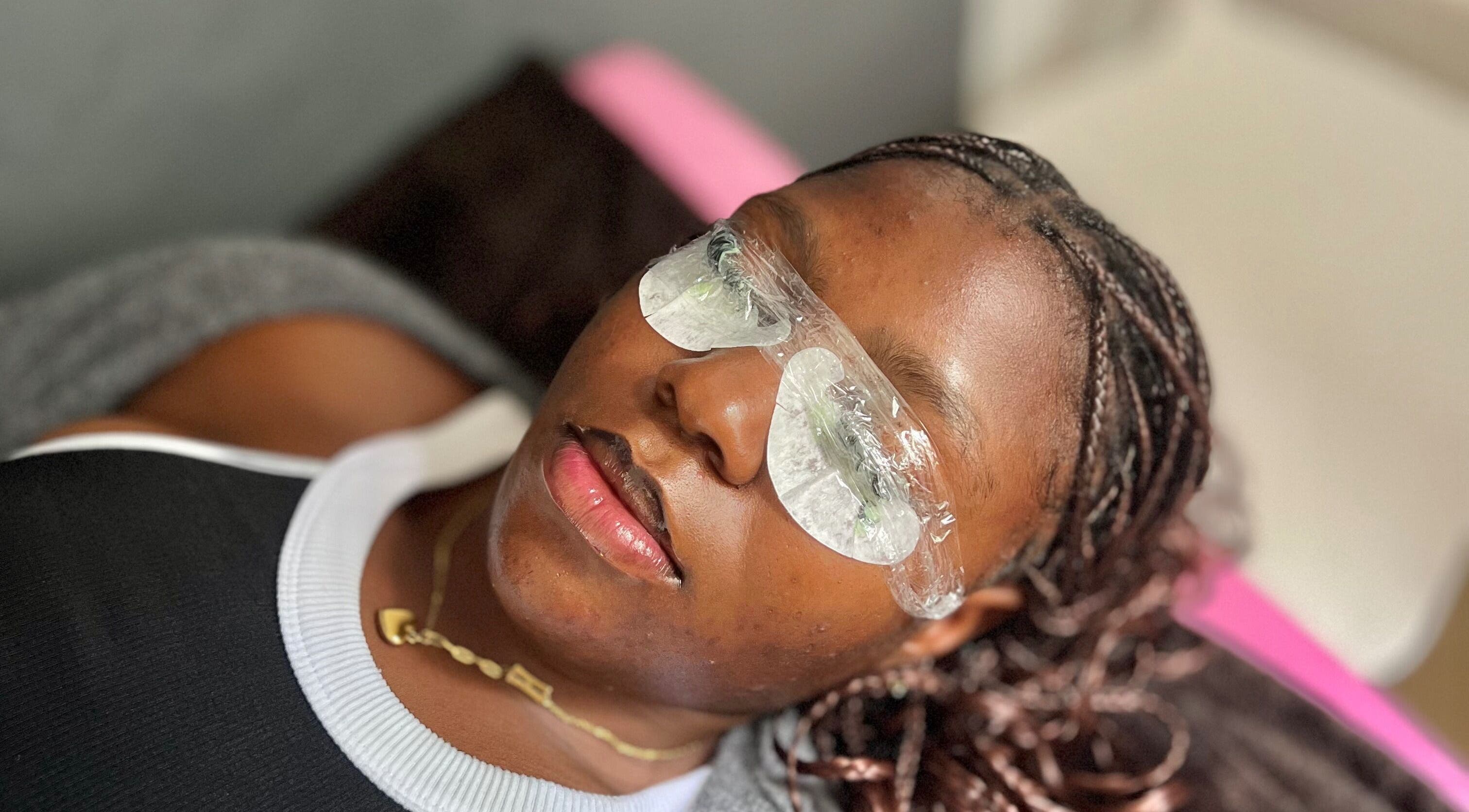 Client relaxing during treatment at Azure beauty parlour eyelashes and makeup, Kitwe, Copperbelt Province, ZM.