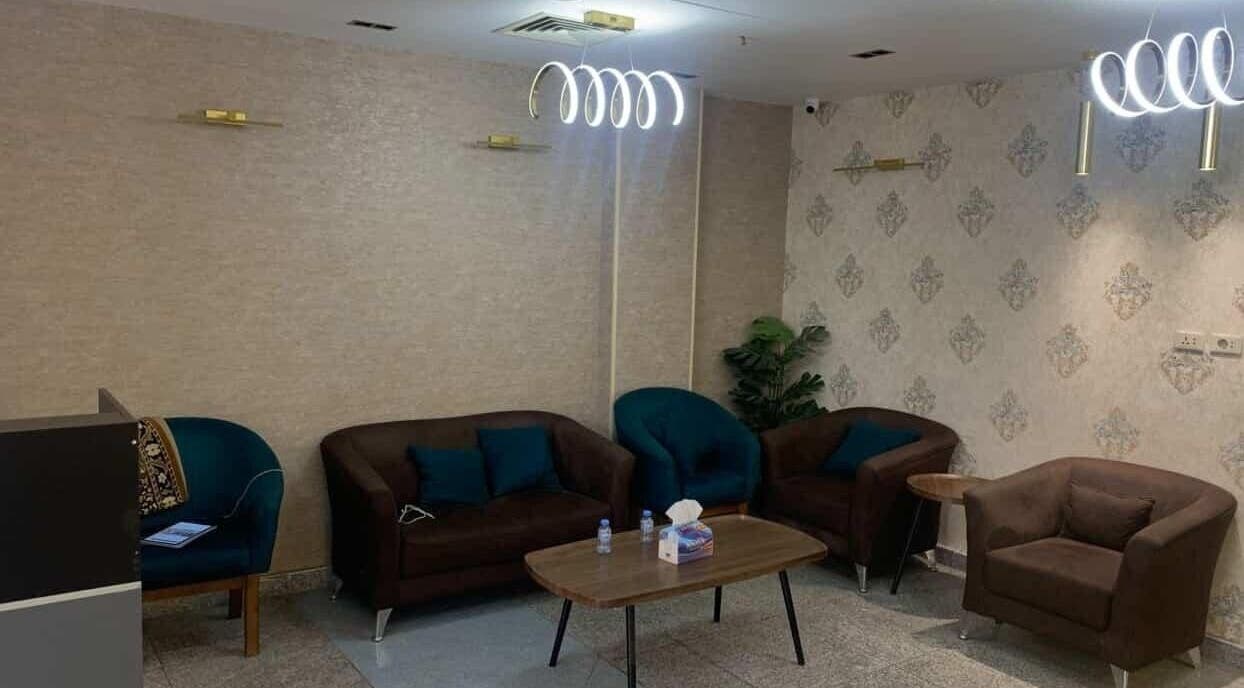 Spacious lounge at صالون حلاقه in عمّان, محافظة العاصمة, JO with modern decor and plush seating.