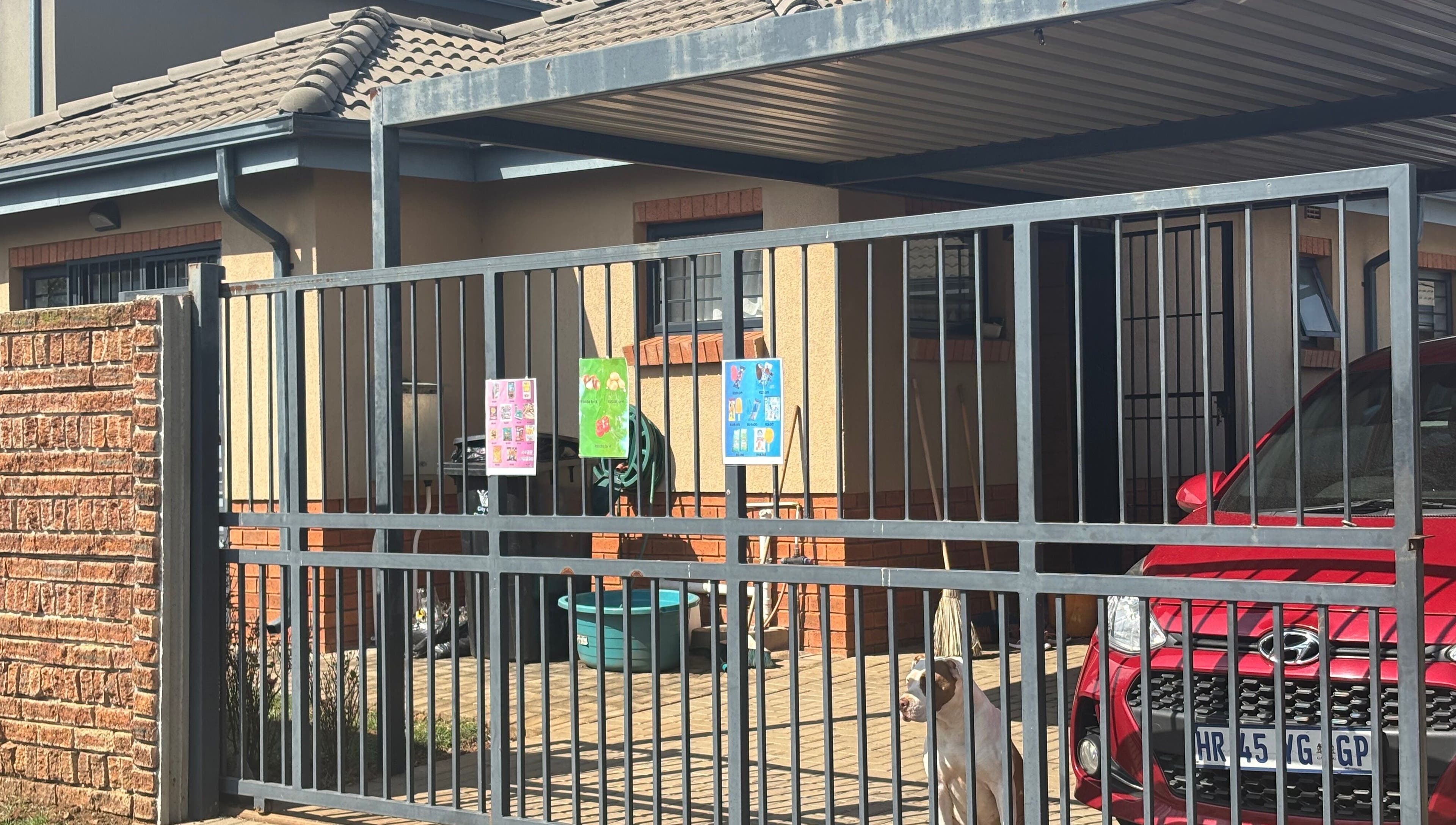 Entrance to Nails by Nelz in Alberton, Gauteng, ZA featuring a secure gate and a welcoming atmosphere.