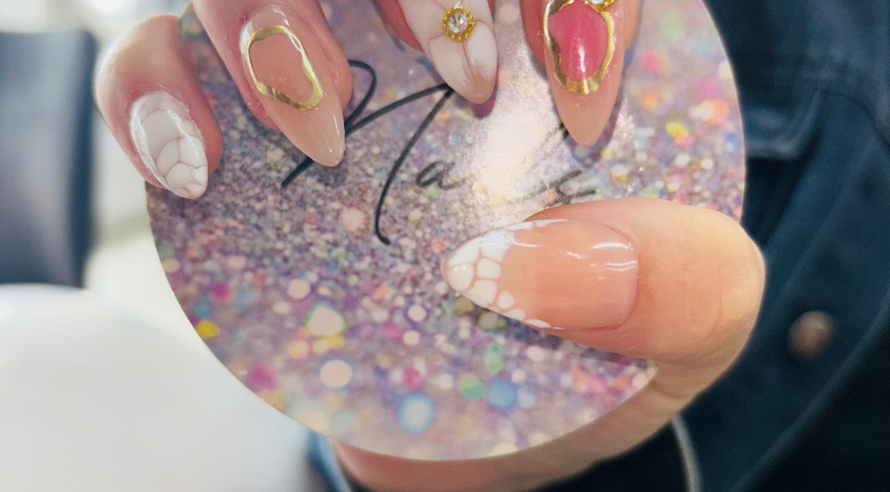 Elegant manicured nails with jewels at Nails by Nelz, Alberton, Gauteng, ZA.