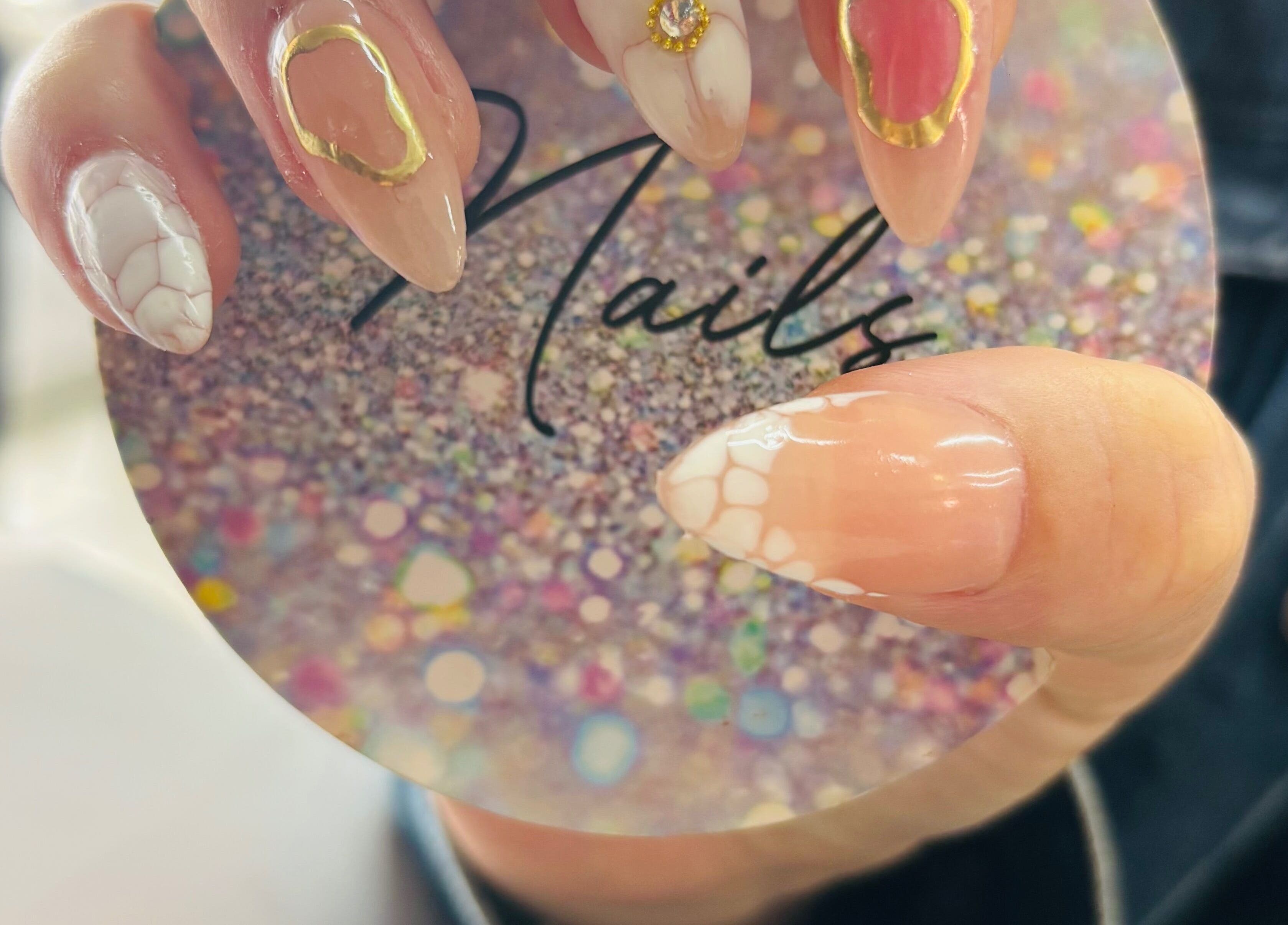 Elegant marble and gold nail art at Nails by Nelz, Alberton, Gauteng, ZA.