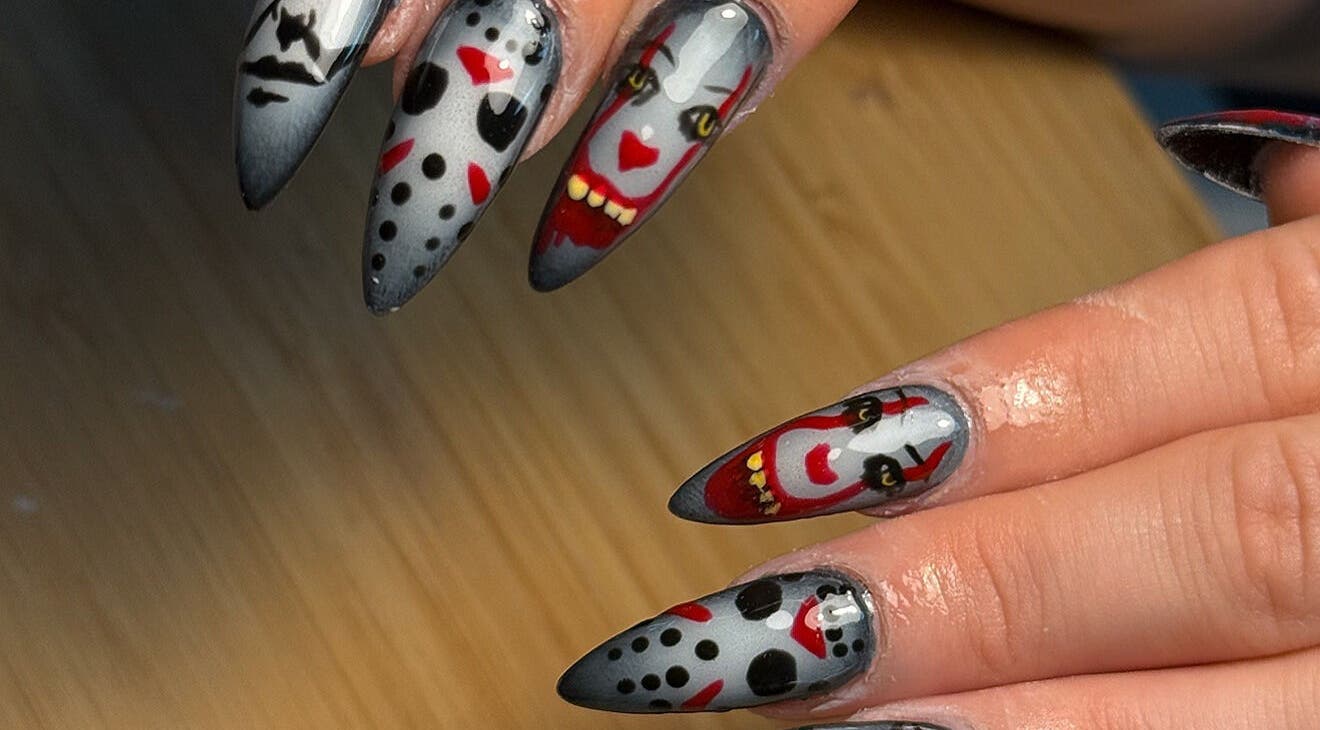 Unique spooky nail art at Glossy Babe, Wakefield, England, GB, featuring creepy designs on long nails.