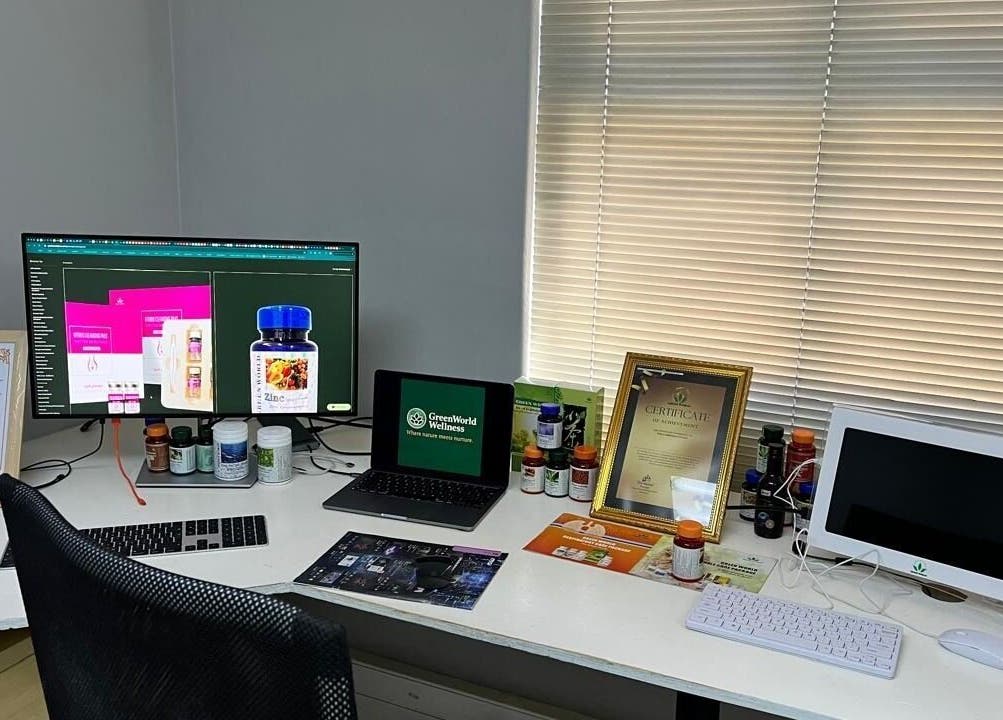 Green World Wellness office in Cape Town, Western Cape, ZA showcasing certificates and wellness products.