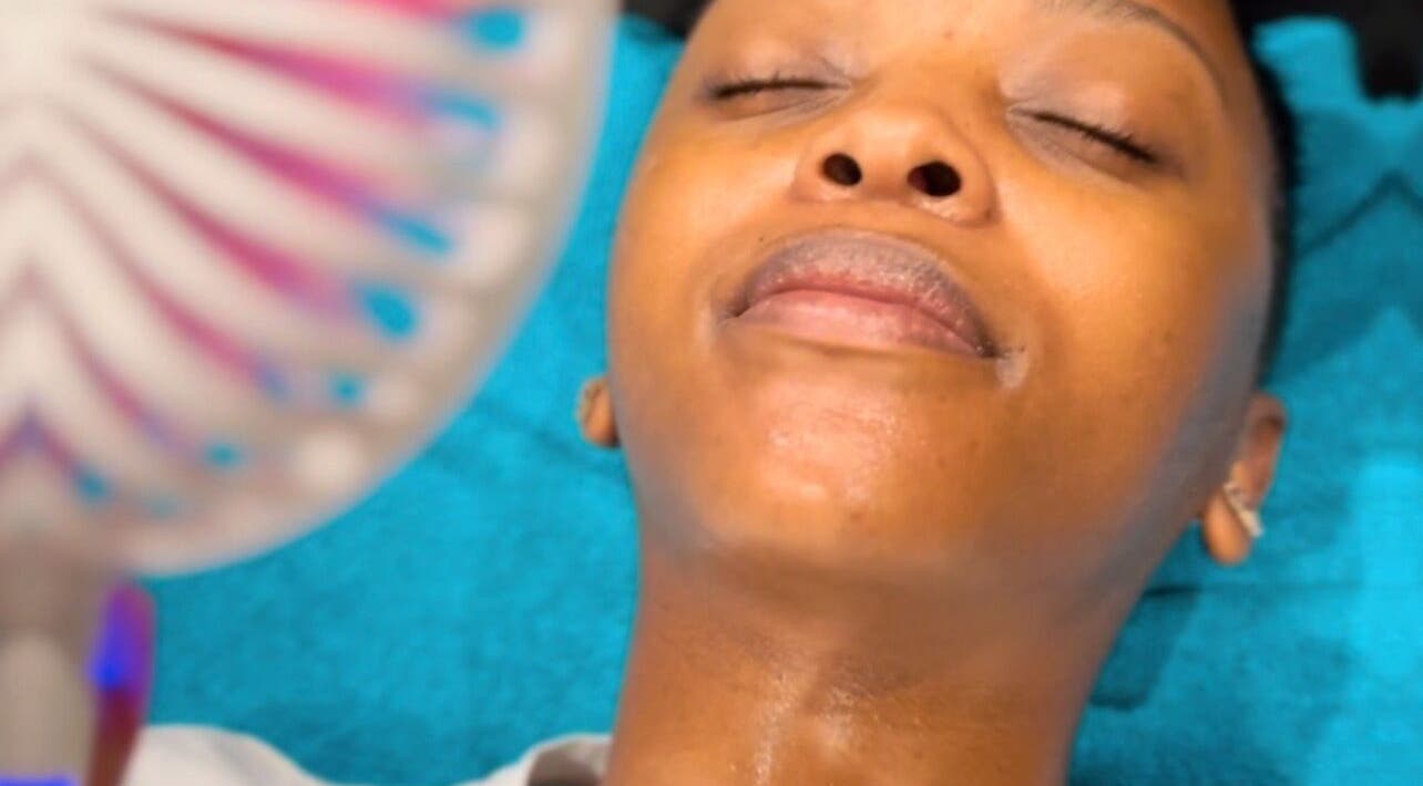 Client enjoying facial treatment at Skincare & Aesthetics Clinic, Pretoria, Gauteng, ZA.
