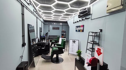 Modern interior of HAFcutz Barbershop in Johor Bahru, Johor Darul Ta'zim, MY with stylish decor and barber chairs.