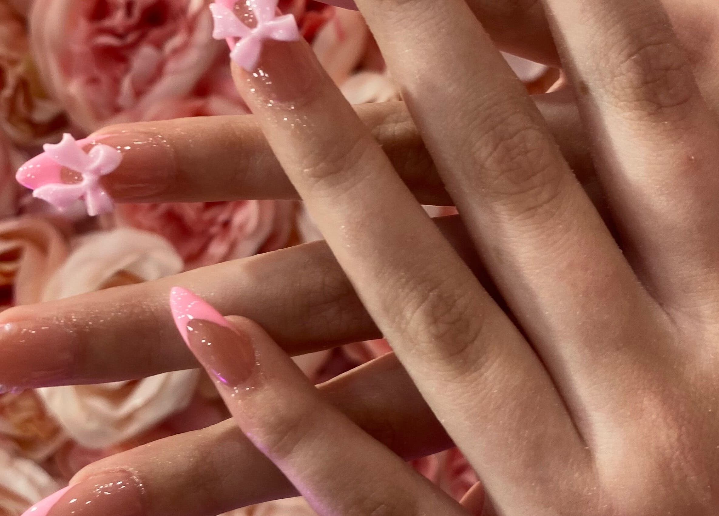 Elegant floral nail art at Ash Beauty Collective in Cape Town, Western Cape, ZA, showcasing intricate pink designs.