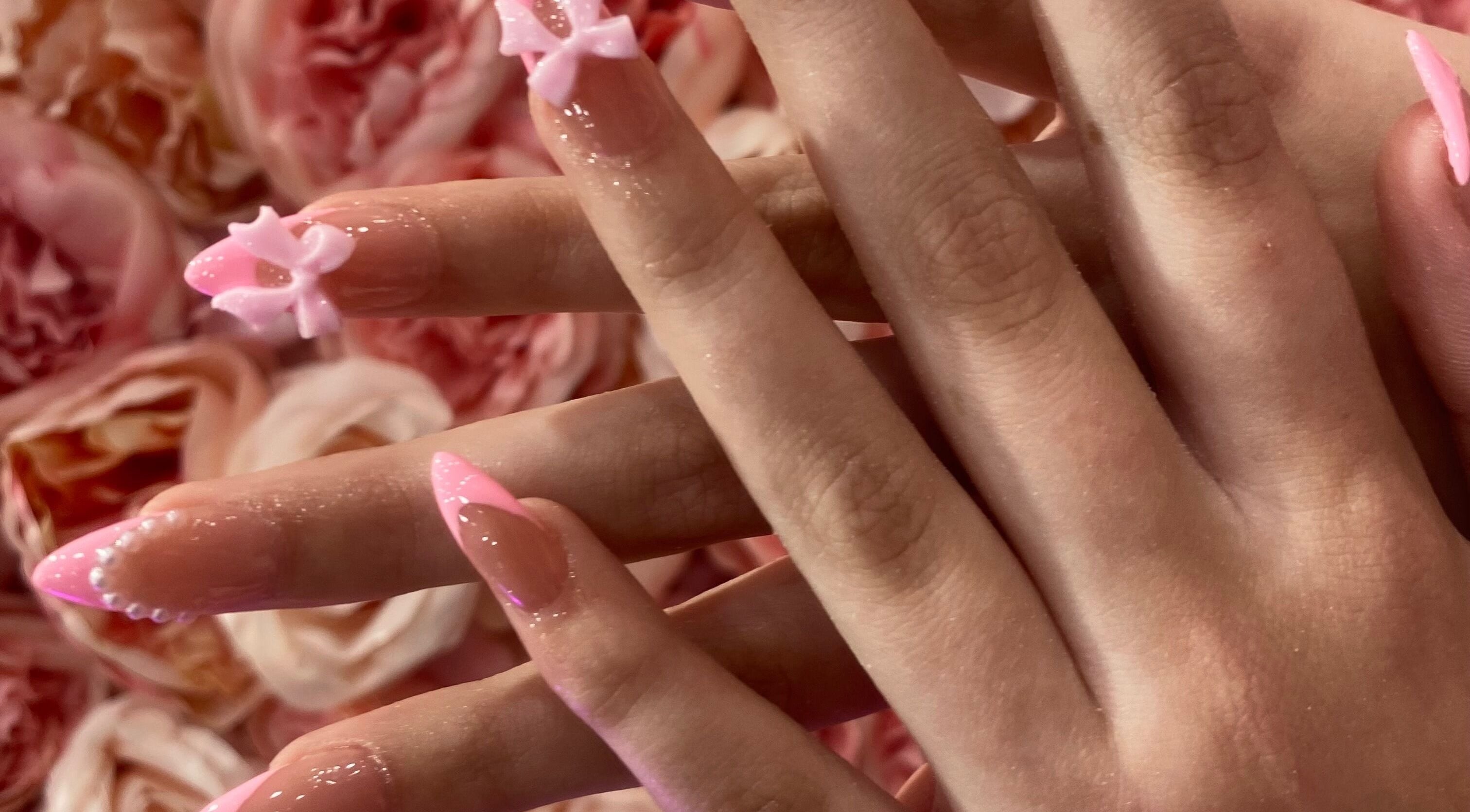 Elegant floral nail art at Ash Beauty Collective in Cape Town, Western Cape, ZA, showcasing intricate pink designs.