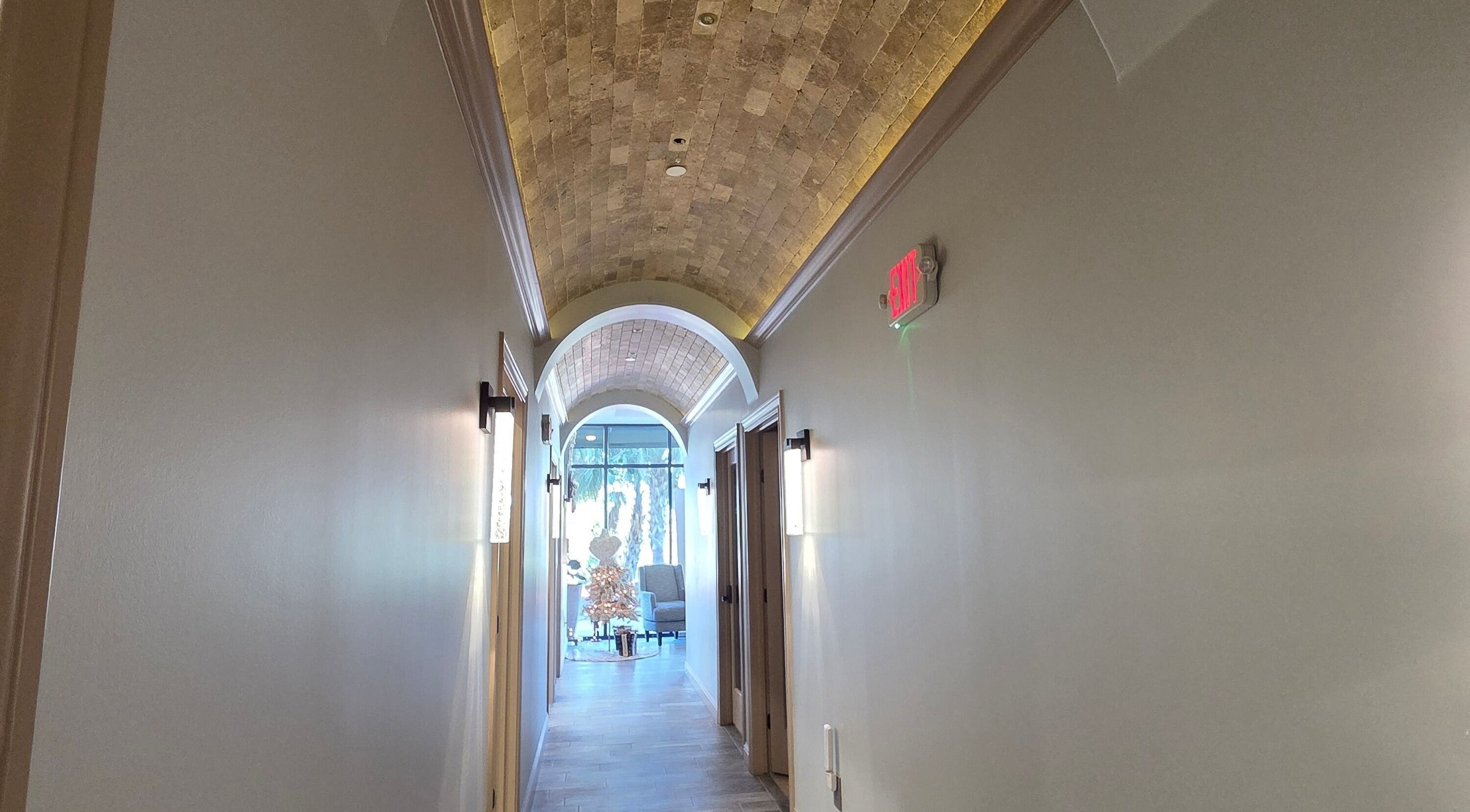 Elegant hallway with arch ceiling at Viva la Vicksen, Leander, Texas, US.