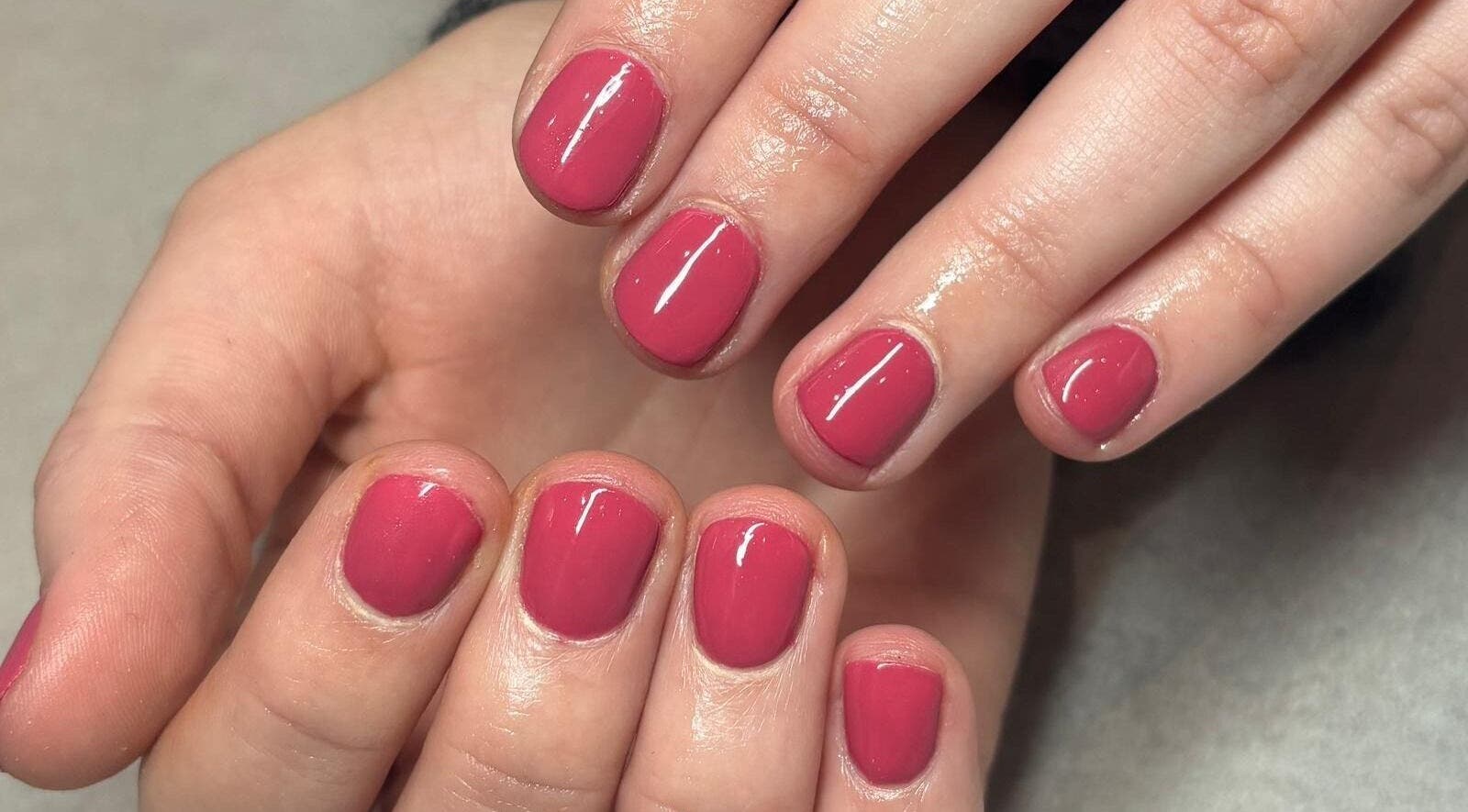 Close-up of elegant pink manicure at NailsbyFrankie, Bognor Regis, England, GB.