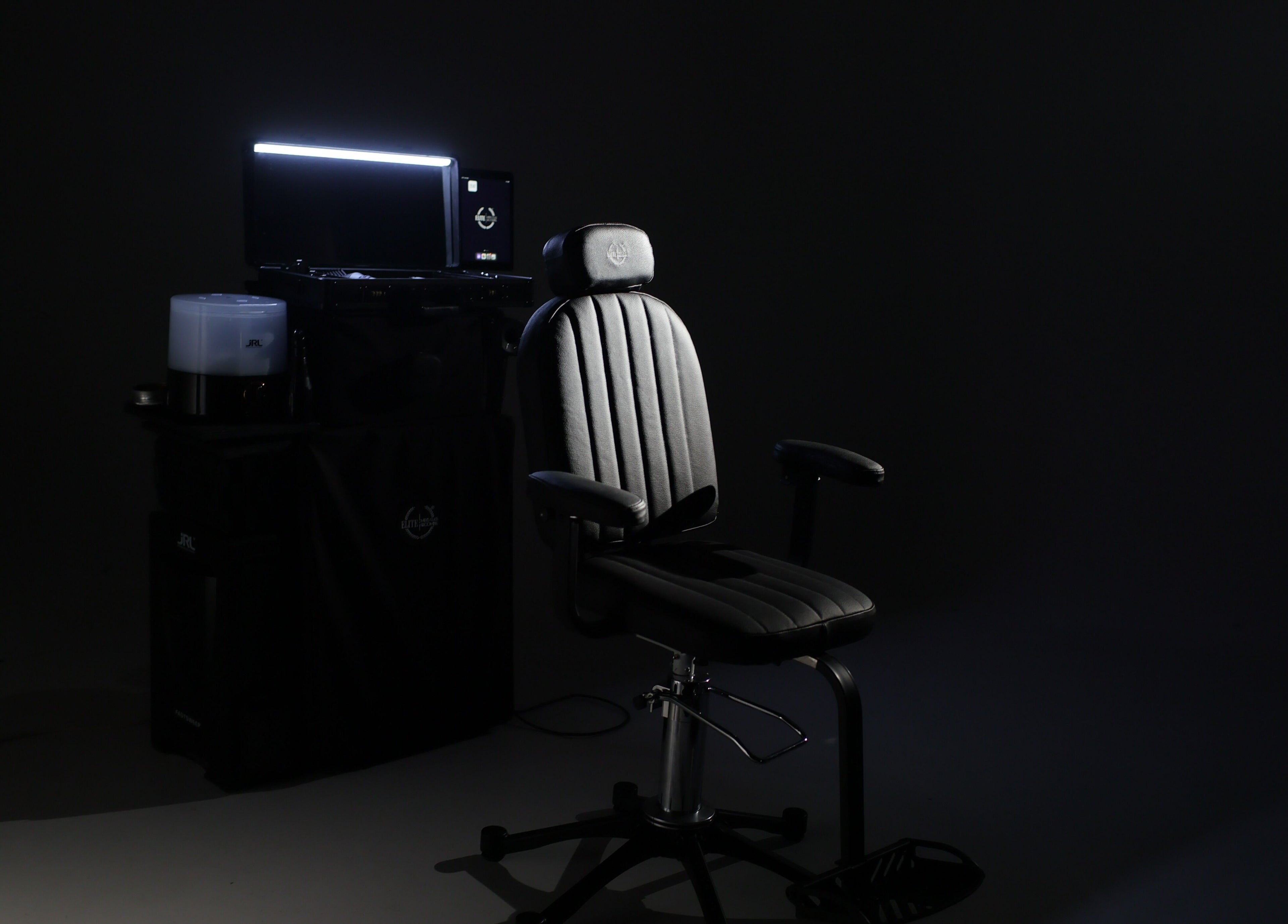 Barber chair at Elite Home Private Barber, Dubai, Dubai, AE. Modern elegance in a sleek setup.