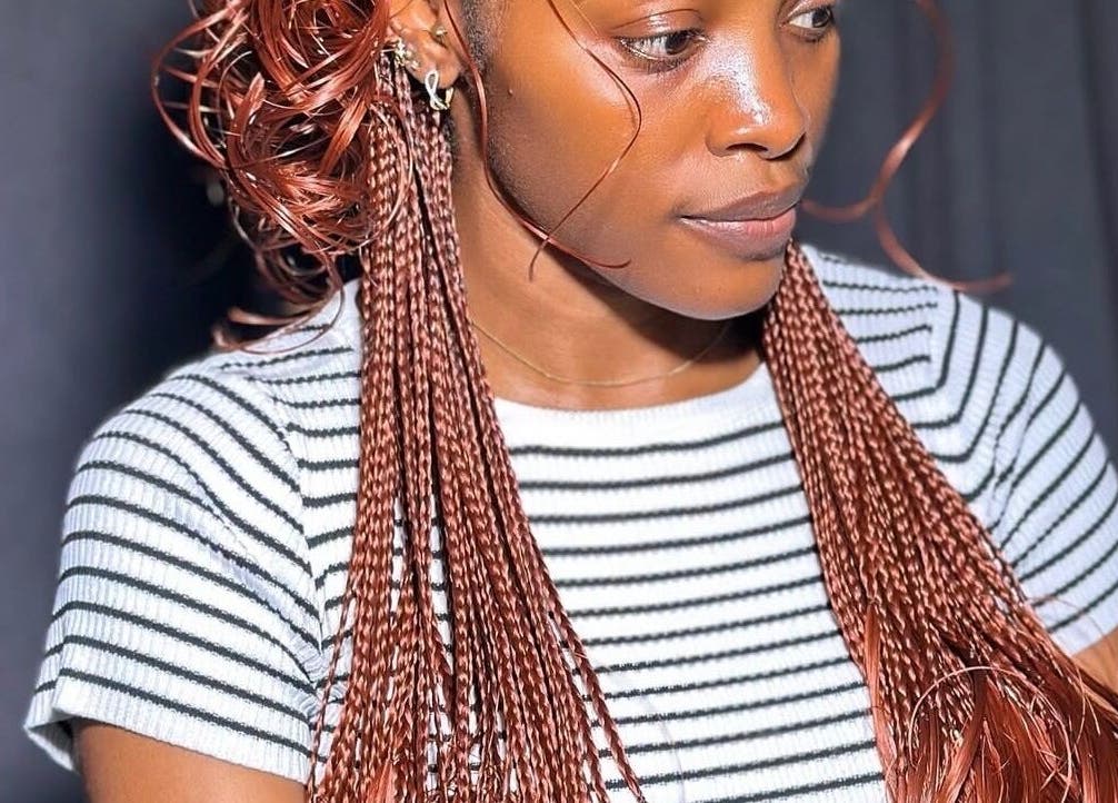 Stylishly braided hair at Braids O’clock Oasis Parlour in Accra, Greater Accra Region, GH.