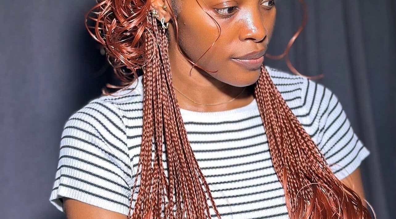 Stylishly braided hair at Braids O’clock Oasis Parlour in Accra, Greater Accra Region, GH.