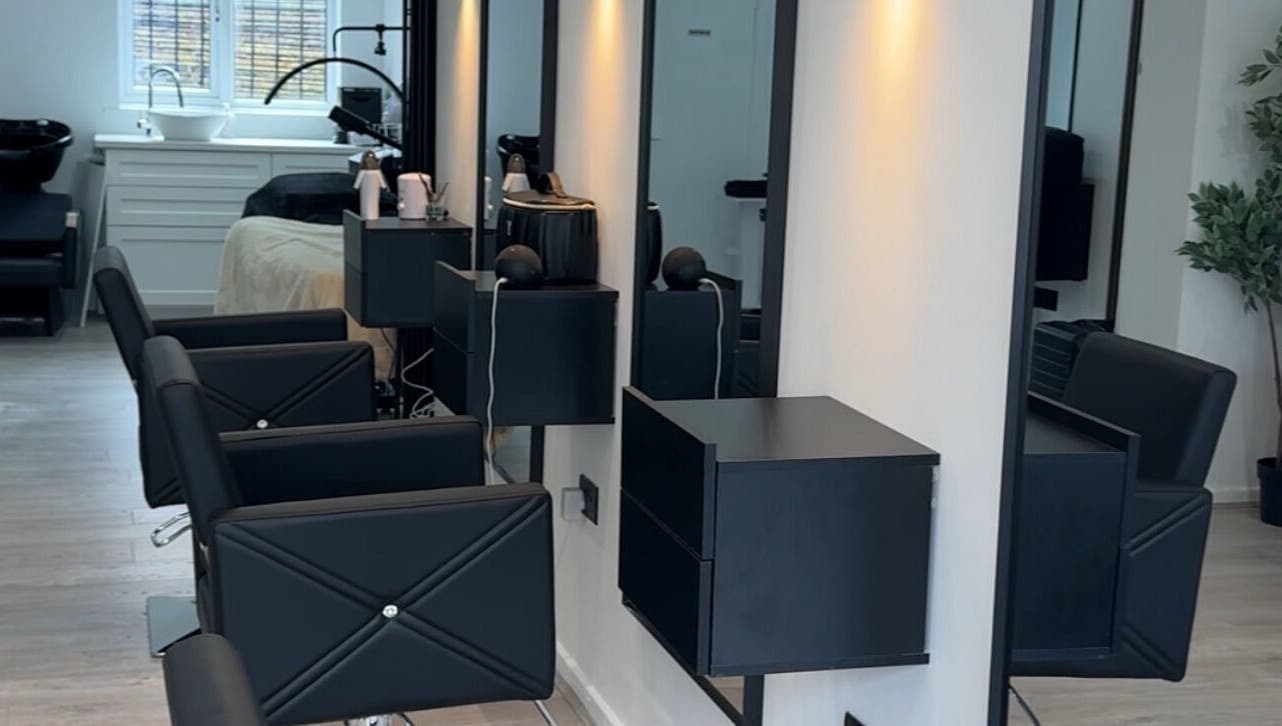 Modern salon chairs and mirrors at Beauty By Tasha x in Sheffield, England, GB.