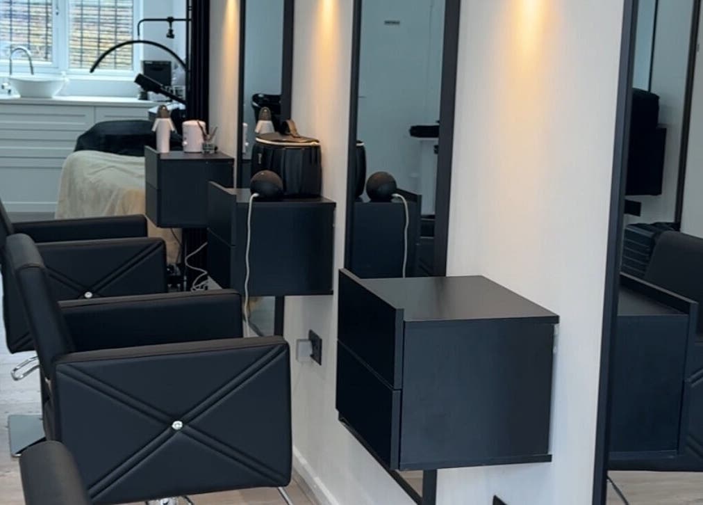 Modern salon chairs and mirrors at Beauty By Tasha x in Sheffield, England, GB.