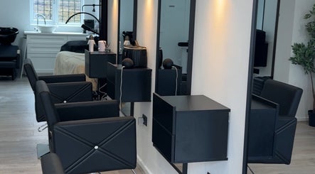 Modern salon chairs and mirrors at Beauty By Tasha x in Sheffield, England, GB.